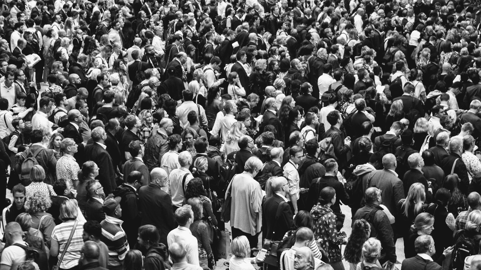 A monochrome crowd seen from above